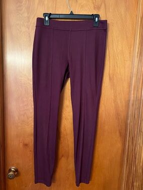 NWOT size medium burgundy leggings with front seam